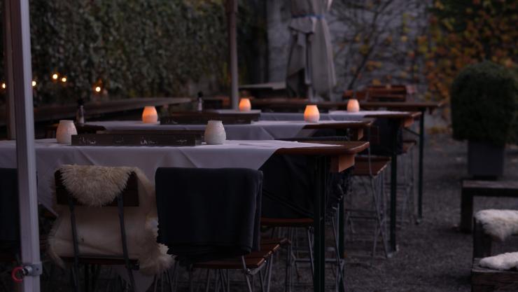 Outdoor seating area with candles