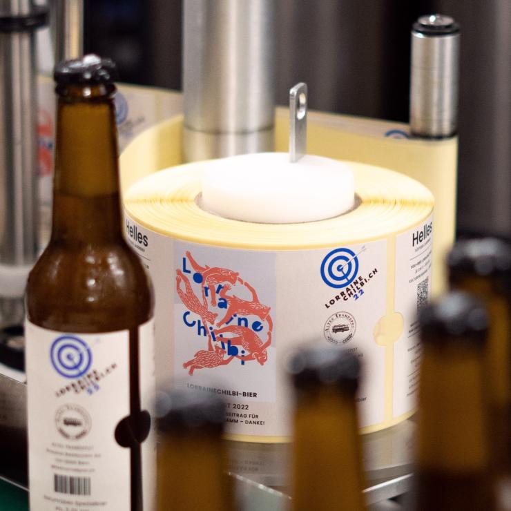 Beer with personalized label on beer filling machine